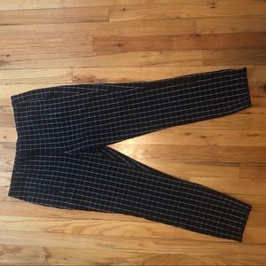 Black pants with white squared stripes
